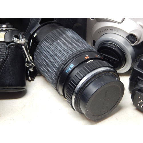 628 - A Quantity of Cameras, Lenses & Accessories Including Canon EOS 650, Pentax ME Super & Fujifilm MX 2... 