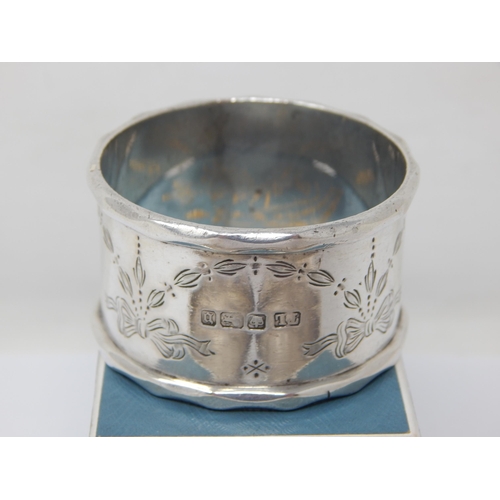 105 - A Pair of Heavy Silver Napkin Rings Hallmarked Chester 1911 together with an Edwardian Silver Napkin... 