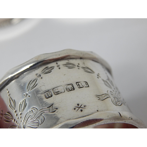 105 - A Pair of Heavy Silver Napkin Rings Hallmarked Chester 1911 together with an Edwardian Silver Napkin... 