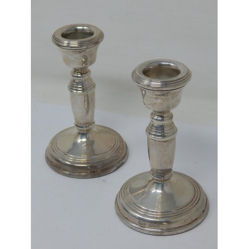 125 - A Pair of Silver Candlesticks Hallmarked Birmingham 1973 by Broadway & Co 10.5cm high together with ... 