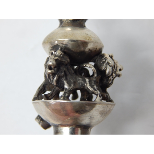 132 - Judaica: Silver Torah Pointer with Lion Mounted Finial & Ringed Top: Set with a Turquoise Cabochon: ... 