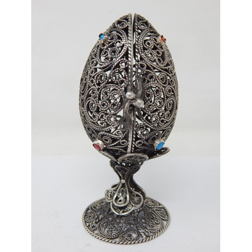 140 - Judaica: Silver Filigree Egg with Set Cabochons on Stand: The Egg Opening to reveal the Tanakh: Mark... 