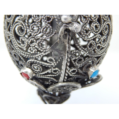 140 - Judaica: Silver Filigree Egg with Set Cabochons on Stand: The Egg Opening to reveal the Tanakh: Mark... 