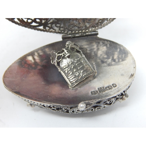 140 - Judaica: Silver Filigree Egg with Set Cabochons on Stand: The Egg Opening to reveal the Tanakh: Mark... 