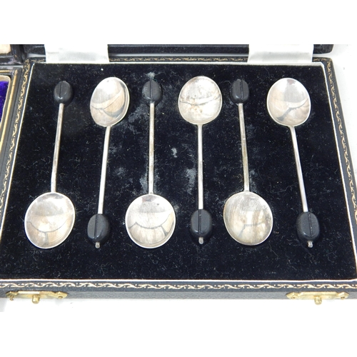 145 - A Set of 6 Silver Coffee Spoons with Bean Finials in Fitted Case: Hallmarked Birmingham 1946 by Suck... 