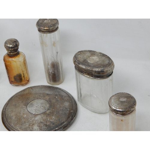 176 - A Quantity of Silver Mounted Dressing Table Jars, Hand Mirror & Brushes: Various Dates & Makers