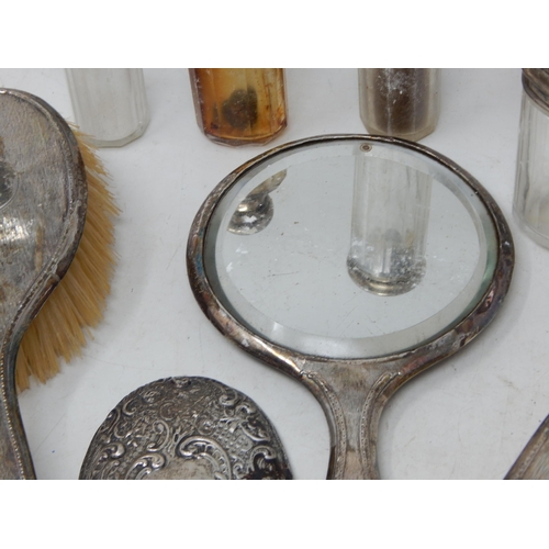 176 - A Quantity of Silver Mounted Dressing Table Jars, Hand Mirror & Brushes: Various Dates & Makers