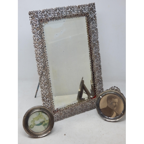 177 - A Large White Metal Easel Table Mirror 37cm x 24.5cm together with Two Hallmarked Silver Photograph ... 