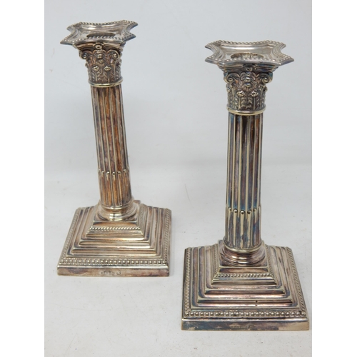 A Pair of Late C19th Silver Plated Corinthian Column Candlesticks with removeable Sconces: Height 22cm
