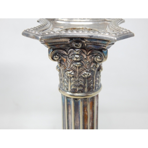 179 - A Pair of Late C19th Silver Plated Corinthian Column Candlesticks with removeable Sconces: Height 22... 