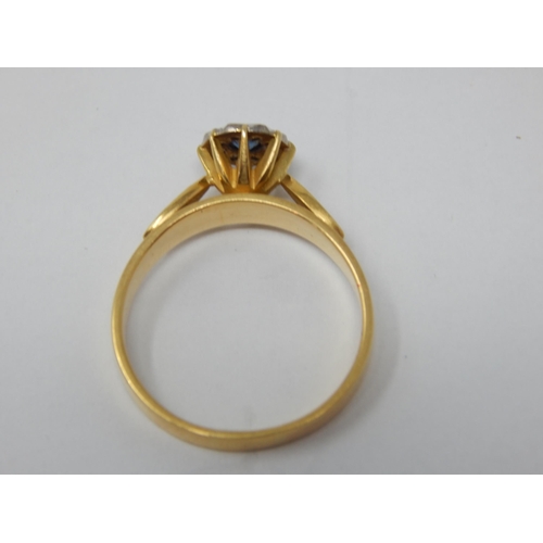 277 - 18ct Yellow Gold Ring Set with a central sapphire within a border of diamonds: Ring size P: gross we... 