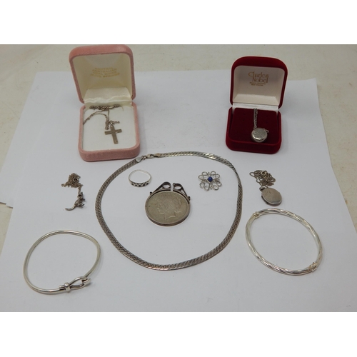 283 - A Quantity of Sterling Silver Jewellery to Include Necklaces, Bangles, Rings etc together with a US ... 