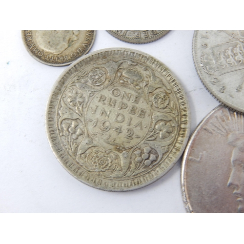 70 - Silver Florins, Silver Sixpences & Threepences together with a Silver One Rupee & a Silver Dollar 19... 