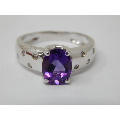 9ct White Gold Ring Set with a Central Amethyst 1.5cts & Diamond Studded Band: Ring Size M: Gross weight 3.15g