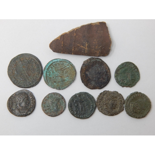 90B - A Collection of Roman Coins together with a Roman Pottery Fragment.