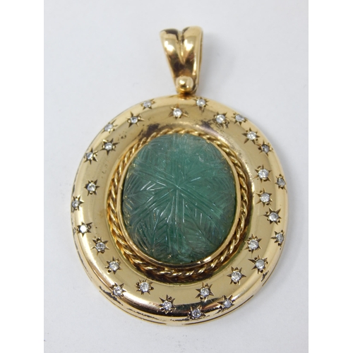 149 - Bespoke 18ct Yellow Gold Emerald & Diamond Pendant: The Hand Carved Emerald Approx 22.0cts within a ... 