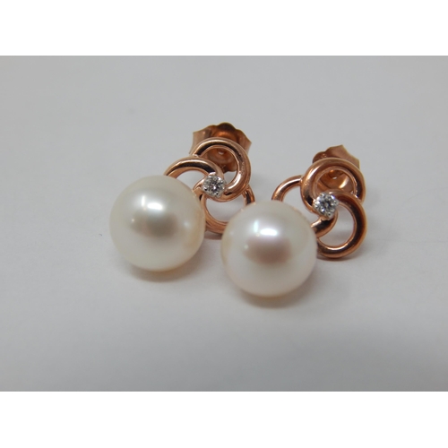 Pair of 9ct rose gold cultured pearl and diamond pinwheel drop earrings. Diamonds 0.05ct