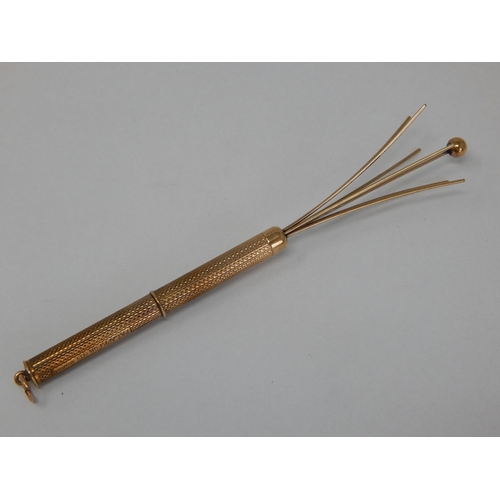 130 - 9ct Gold Cocktail Swizzle Stick: Gross weight 7.78g