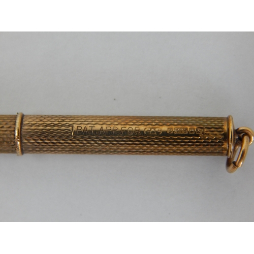 130 - 9ct Gold Cocktail Swizzle Stick: Gross weight 7.78g