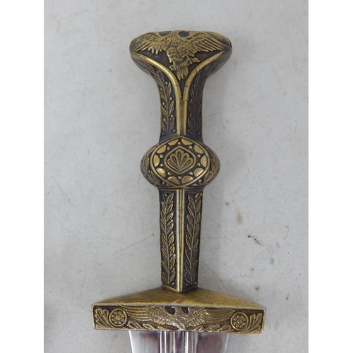 Decorative Short Sword/Dagger with Knopped Brass Hilt & Pommel depicting eagles: The brass scabbard with four belt loops having all over decoration and cartouches depicting the head of a Lion & a Lioness: Overall length 40cm (15.5 inches)