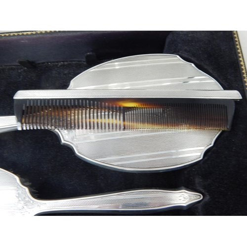 100 - Cased set of Elizabeth II silver four piece dressing table set,
Birmingham 1964,