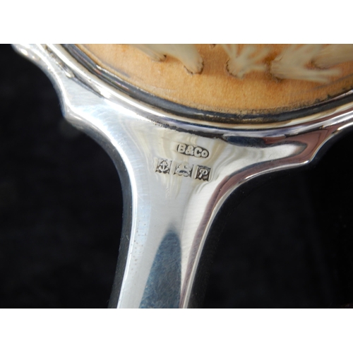 100 - Cased set of Elizabeth II silver four piece dressing table set,
Birmingham 1964,