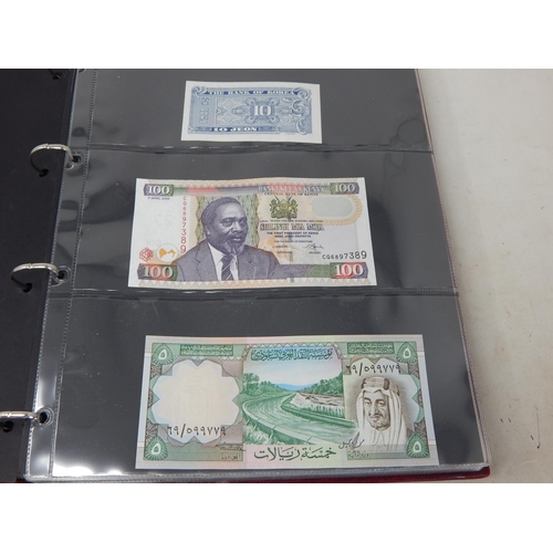 4 - Large collection of World Banknotes housed in 2 x collectors albums generally about Uncirculated and... 