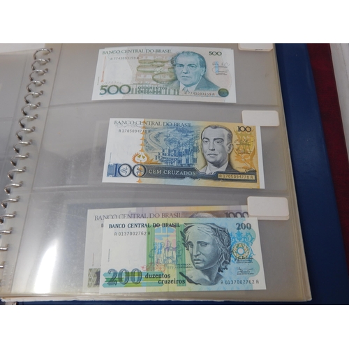 4 - Large collection of World Banknotes housed in 2 x collectors albums generally about Uncirculated and... 