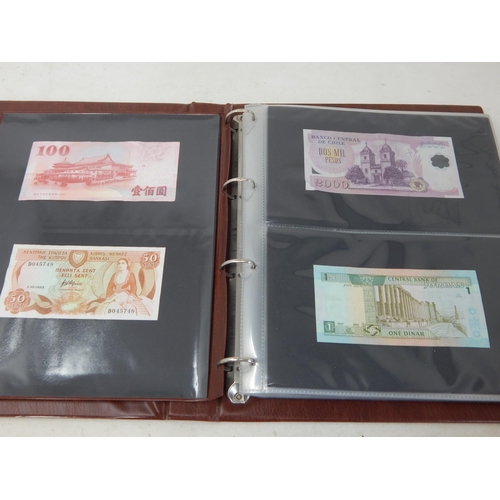 56 - A large collection of Banknotes, mostly high grade, housed in 2 x Collector's albums