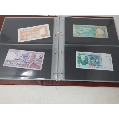 56 - A large collection of Banknotes, mostly high grade, housed in 2 x Collector's albums