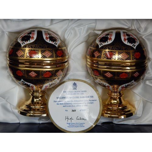 495 - A Royal Crown Derby Old Imari pattern 1128 limited edition Millennium globe thermometer and a Millen... 