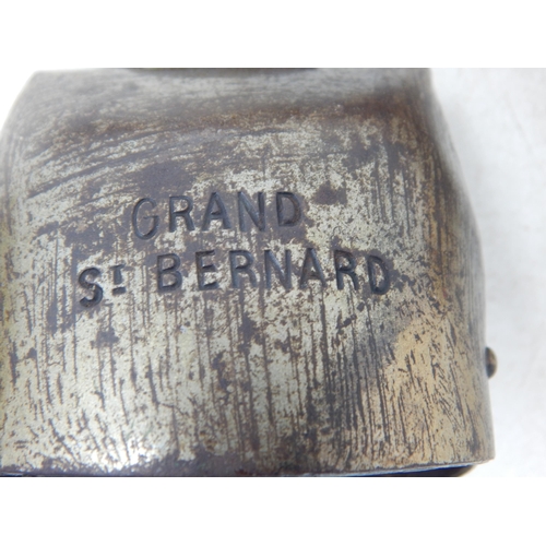 489 - A Vintage Wooden Truncheon together with a Chamonix Cow Bell & a Grand St Bernard Bell