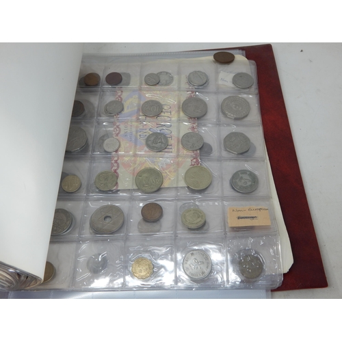 82 - An Album containing a large collection of Coinage including Silver.