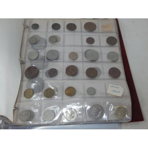 82 - An Album containing a large collection of Coinage including Silver.