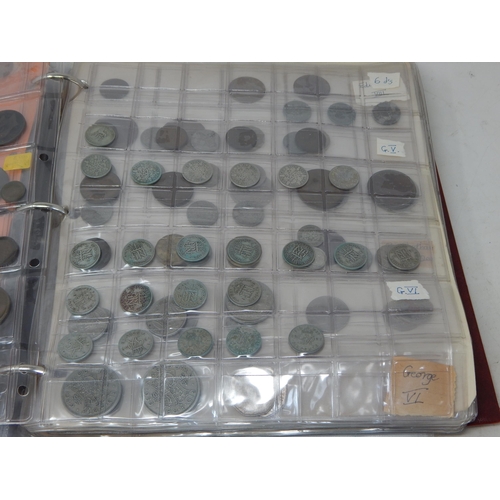 82 - An Album containing a large collection of Coinage including Silver.