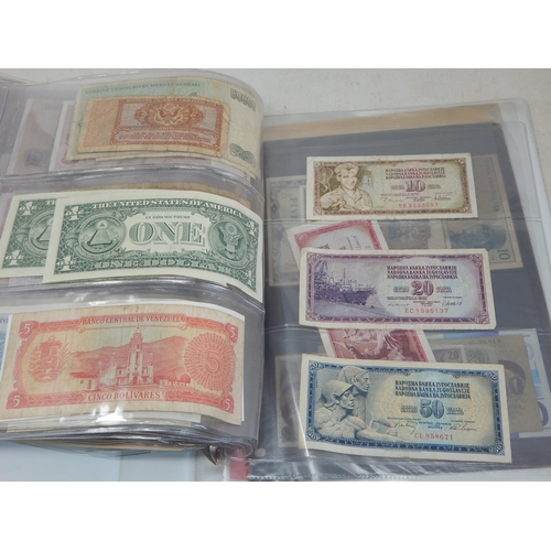 83 - An Album of UK & World Banknotes (lot)