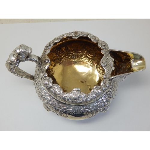 100 - Heavy Gauge George IV Irish Silver Jug with Foliate Decoration to the Rim & Body with Vacant Cartouc... 