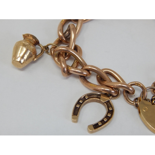 200 - 9ct Gold Charm Bracelet with Attached Charms: Gross weight 40.33g