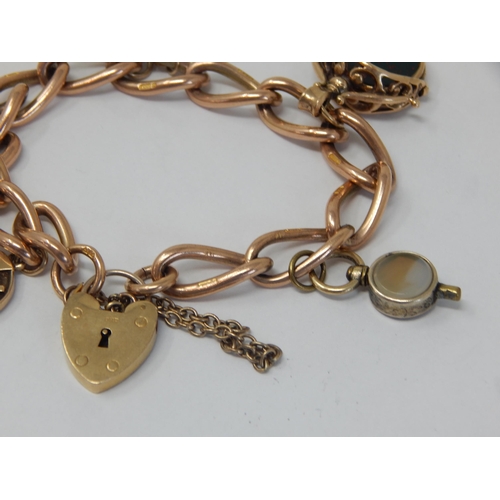 200 - 9ct Gold Charm Bracelet with Attached Charms: Gross weight 40.33g