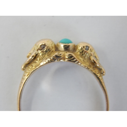 201 - Antique French Gold Ring Set with a Central Turquoise Cabochon Between Two Eagle Heads with Diamond ... 