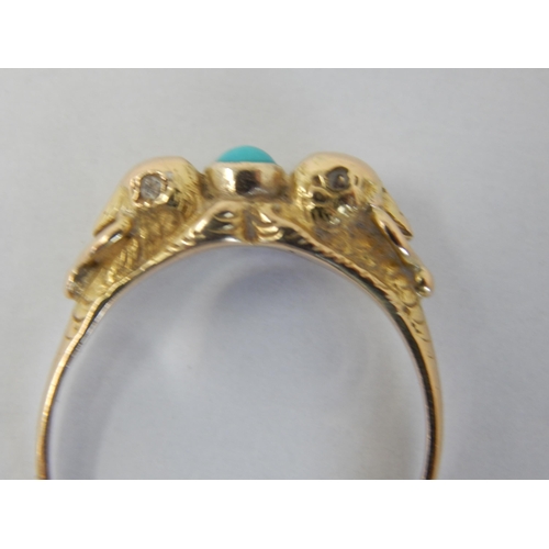 201 - Antique French Gold Ring Set with a Central Turquoise Cabochon Between Two Eagle Heads with Diamond ... 