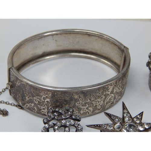 208 - A Victorian Silver Bangle Hallmarked Birmingham 1896 together with a further Silver Bangle, White Me... 