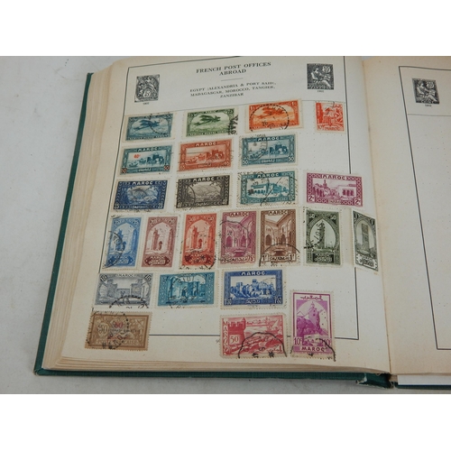 15 - A Substantial Collection of World Stamps Housed in a Vintage Strand Stamp Album Comprising: Great Br... 