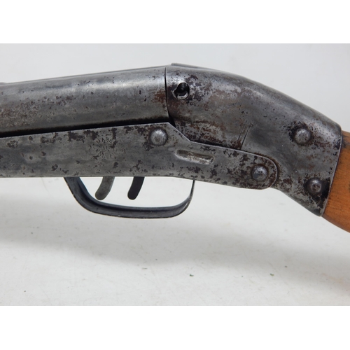 609 - 1920's/30's British Tinplate Cork Firing Double Barrel Shotgun: Overall Length 60cm