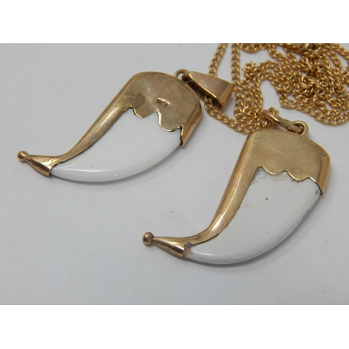 223 - 9ct Gold Mounted Pendants on 9ct Gold Chain: Gross weight 6.18g