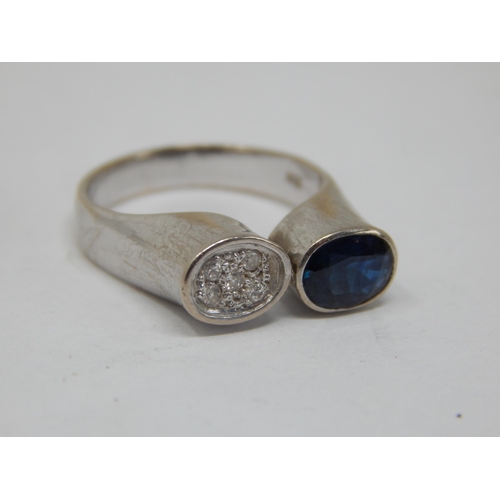 227 - 14ct White Gold Ring Set with a Sapphire & Diamonds: Ring Size L: Gross weight 4.11g