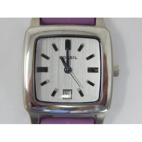 245 - Ladies Fossil Wristwatch with Date Aperture @ 6 o'clock on Original Purple Strap