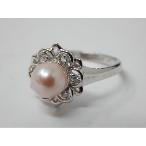 322 - 9ct White Gold Pearl Set Ring: Size J: gross weight 2.21g