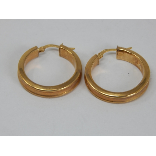 377 - A pair of 9ct Yellow Gold Hoop Earrings: Weight 3.80g: