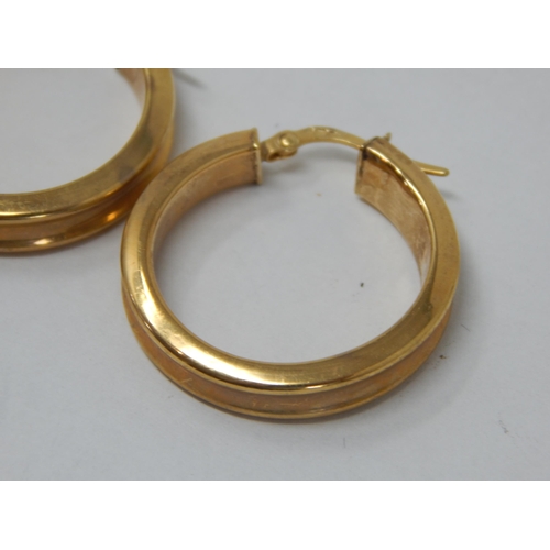 377 - A pair of 9ct Yellow Gold Hoop Earrings: Weight 3.80g: